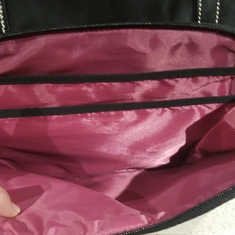 Computer tote w/ many storage area padded for computer